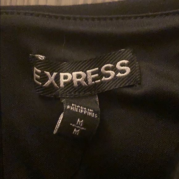 A black express shirt. With zip up back. - Picture 2 of 3